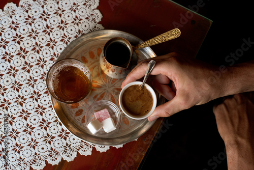 Turkish tea and coffee ritual knolling photo