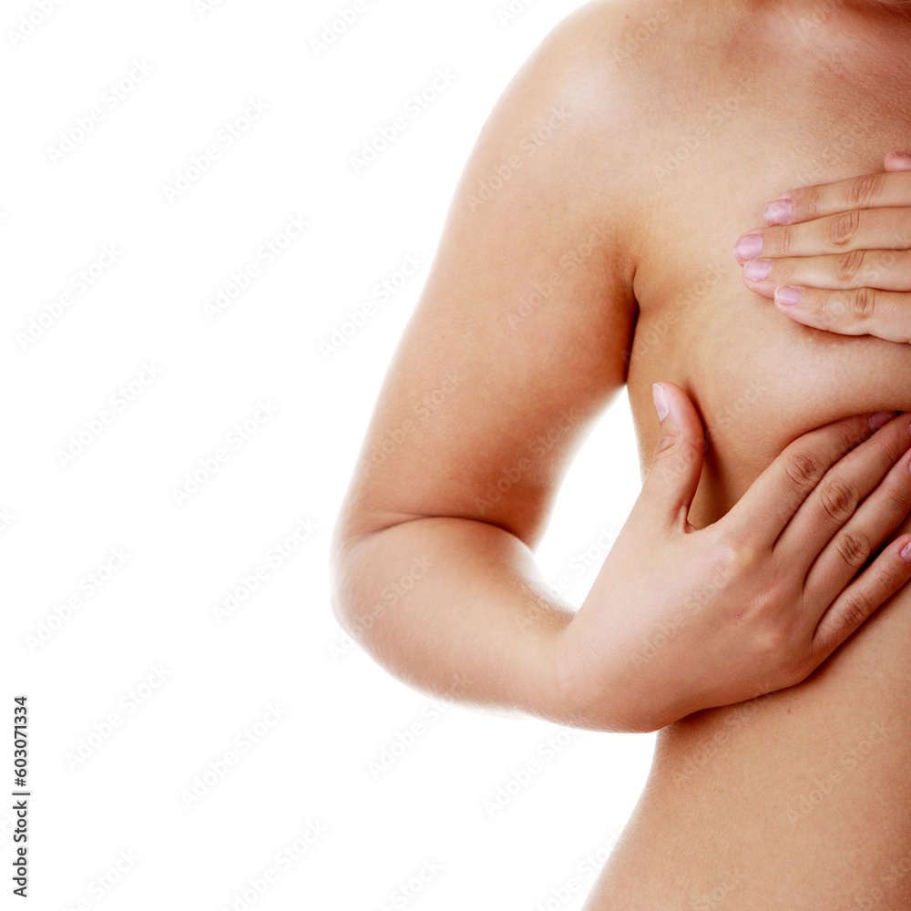 Fototapeta premium Young Caucasian adult woman examining her breast for lumps or signs of breast cancer