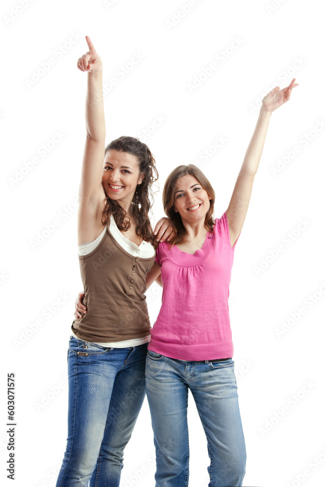 Two beautiful and happy young women isolated over white background Two beautiful and happy young women isolated over white background