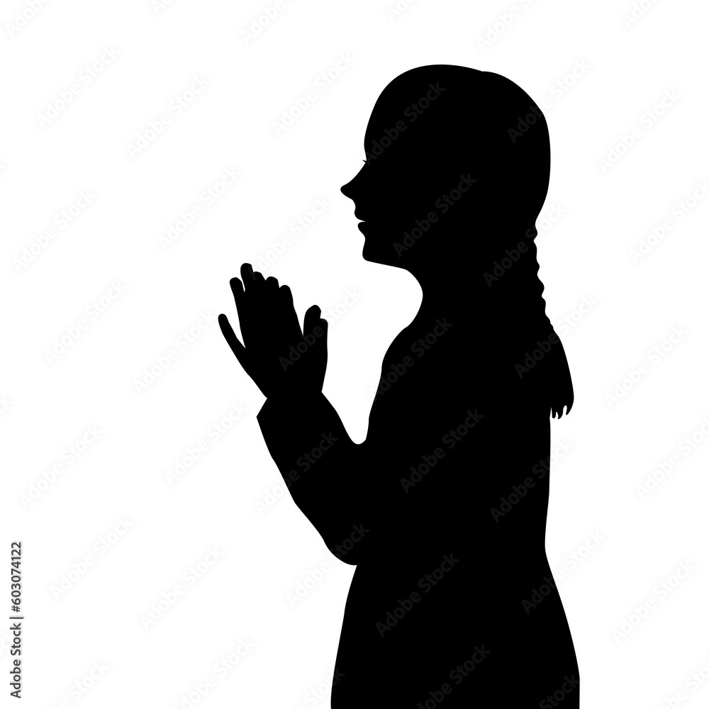 Silhouette of a girl praying
