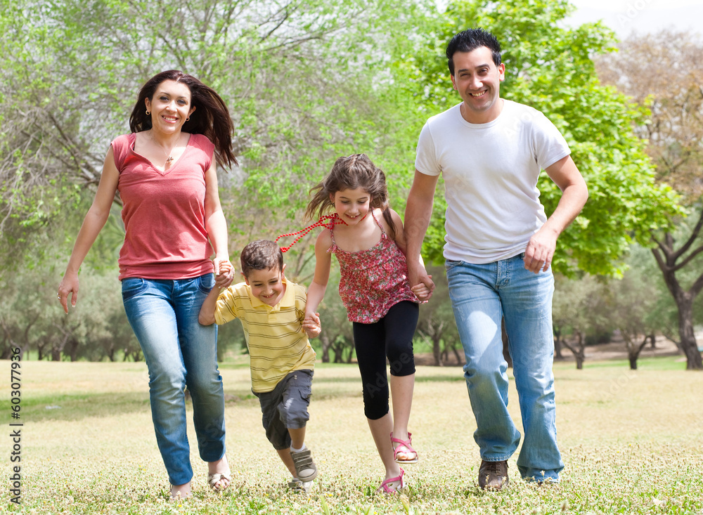 Family running on the park, outdoor Family running on the park, outdoor