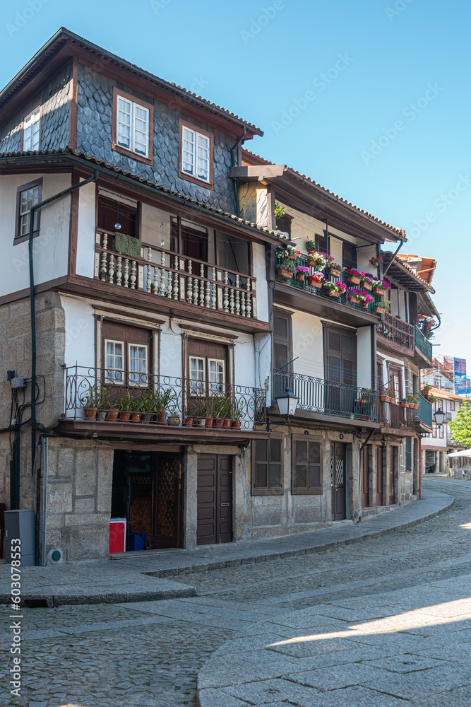 View of a narrow street in the old town of Guimaraes, Portugal