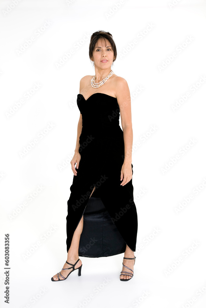 Beautiful Hispanic woman in a black evening gown on a white background Beautiful Hispanic woman in a black evening gown on a white background