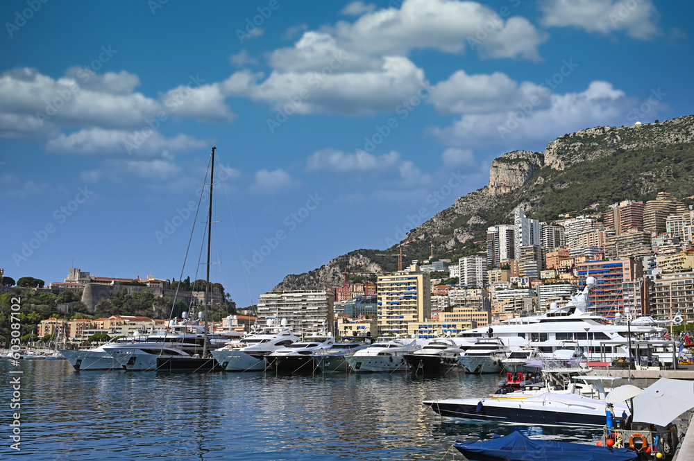Port with yachts and Prince's Palace of Monaco skyline