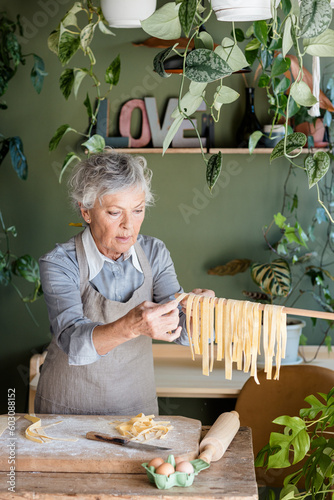 Woman Making Homemade Tagliatelle