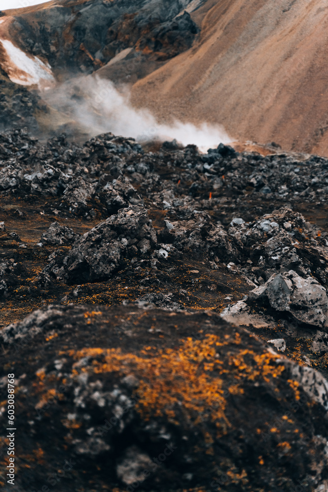 Colored textures of mountains layers and cooled lava field Colored textures of mountains layers and cooled lava field