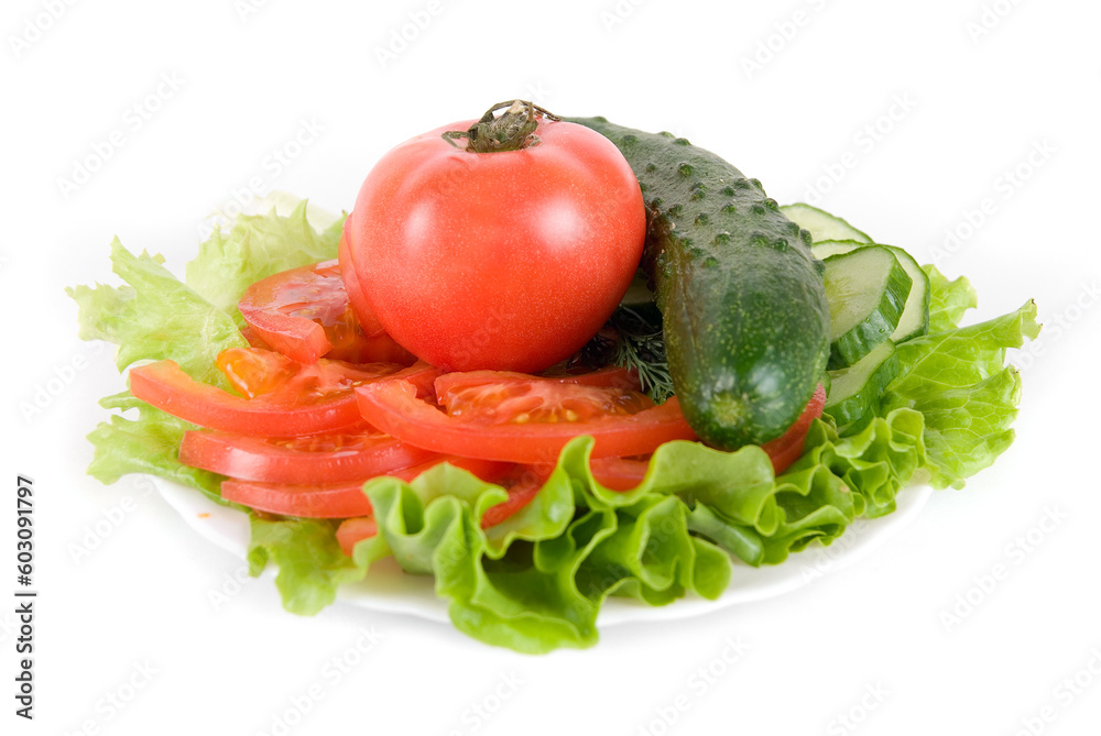 Healthy combination of lettuce, tomato and cucumber on white Healthy combination of lettuce, tomato and cucumber on white