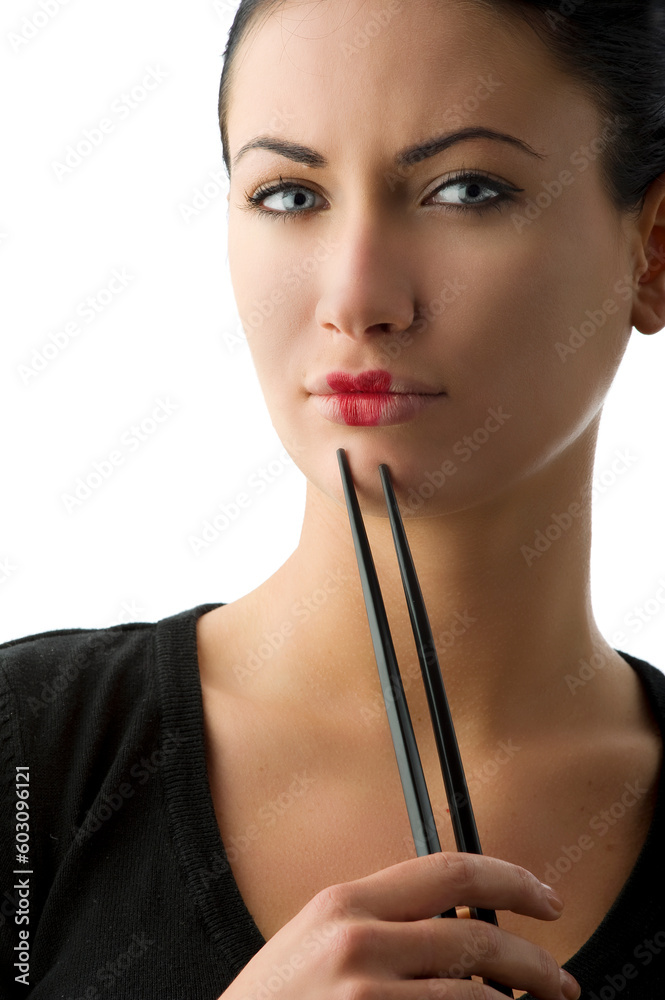 very beautiful woman with classic japanese make up on her lips and black chopstick very beautiful woman with classic japanese make up on her lips and black chopstick