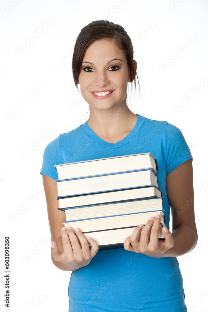Beautiful Caucasian student with a hand full of books Beautiful Caucasian student with a hand full of books