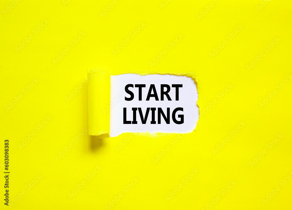 Start living symbol. Concept words Start living on beautiful white paper. Beautiful yellow table yellow background. Business and Start living concept. Copy space. Start living symbol. Concept words Start living on beautiful white paper. Beautiful yellow table yellow background. Business and Start living concept. Copy space.