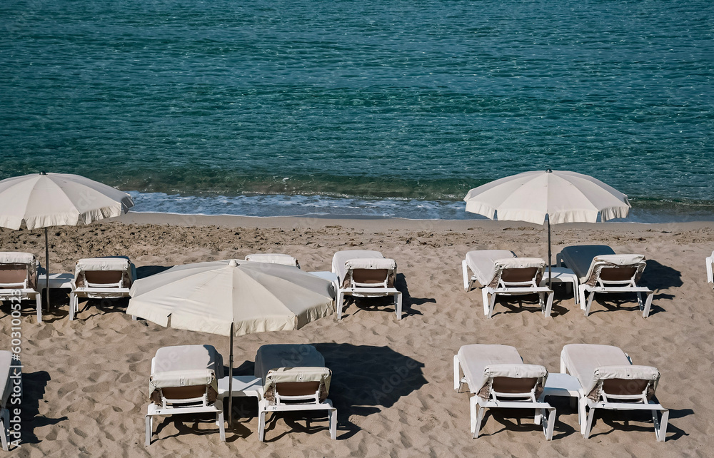 beach chairs and umbrellas