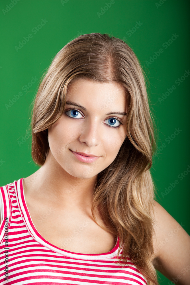 Close-up portrait of a Fresh and Beautiful young woman, isolated on green background Close-up portrait of a Fresh and Beautiful young woman, isolated on green background
