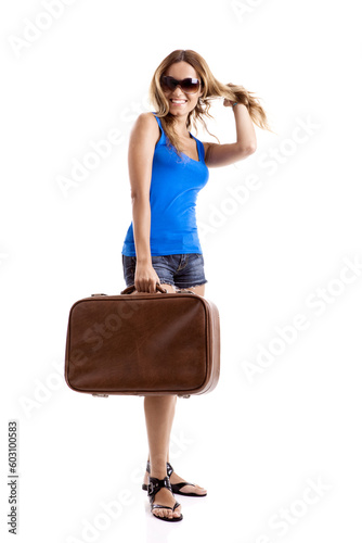 Beautiful and happy young woman with old leather suitcase, isolated on white