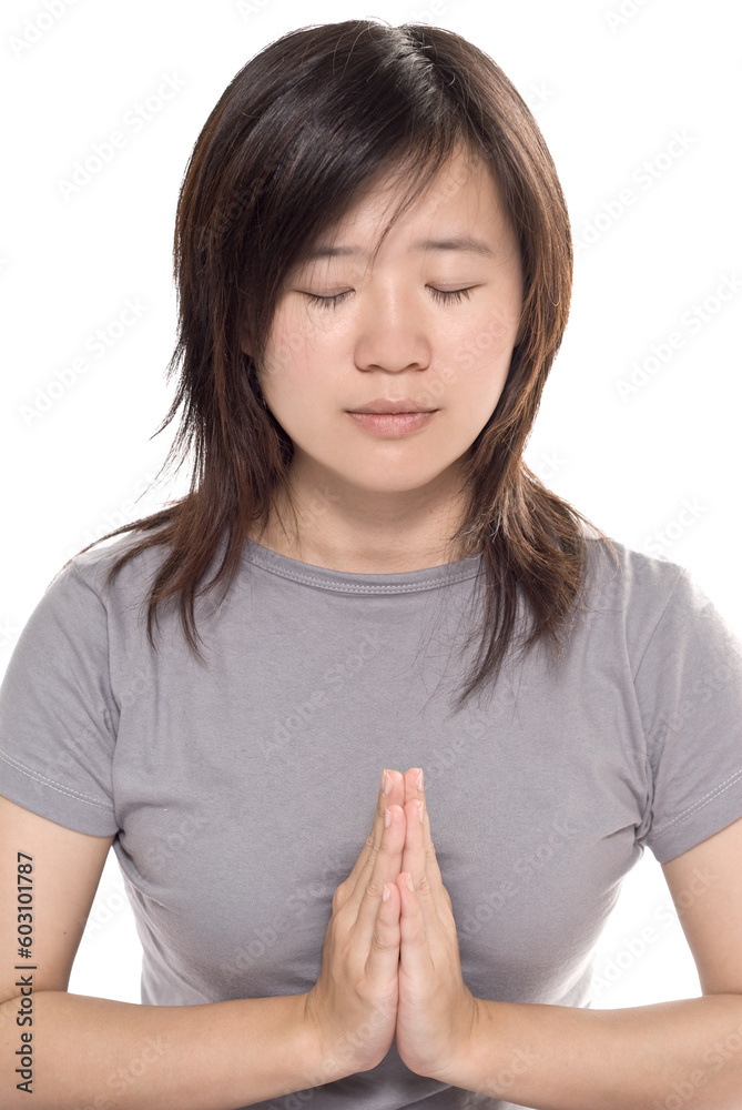 Meditation pose of Asian woman on white background. Meditation pose of Asian woman on white background.