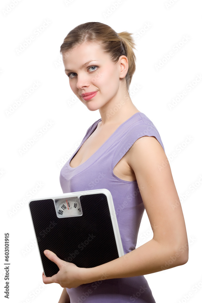 smiling young woman holding a weight scale over white background smiling young woman holding a weight scale over white background