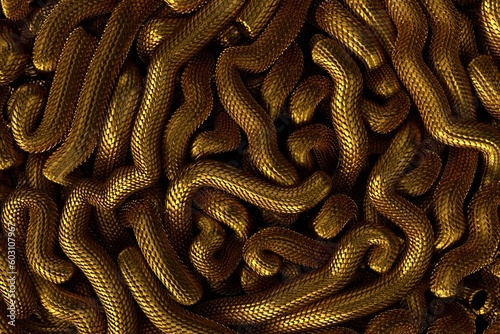 Golden metal texture of dragon or snake scales. photo