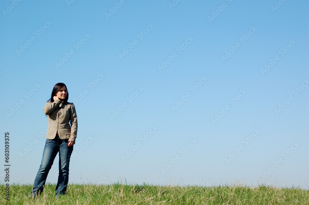 attractive brunette woman on sky background attractive brunette woman on sky background
