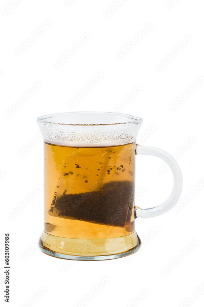 Cup of black tea with tea-bag on white background Cup of black tea with tea-bag on white background