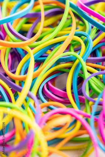 Many colorful rubber bands. Closeup.