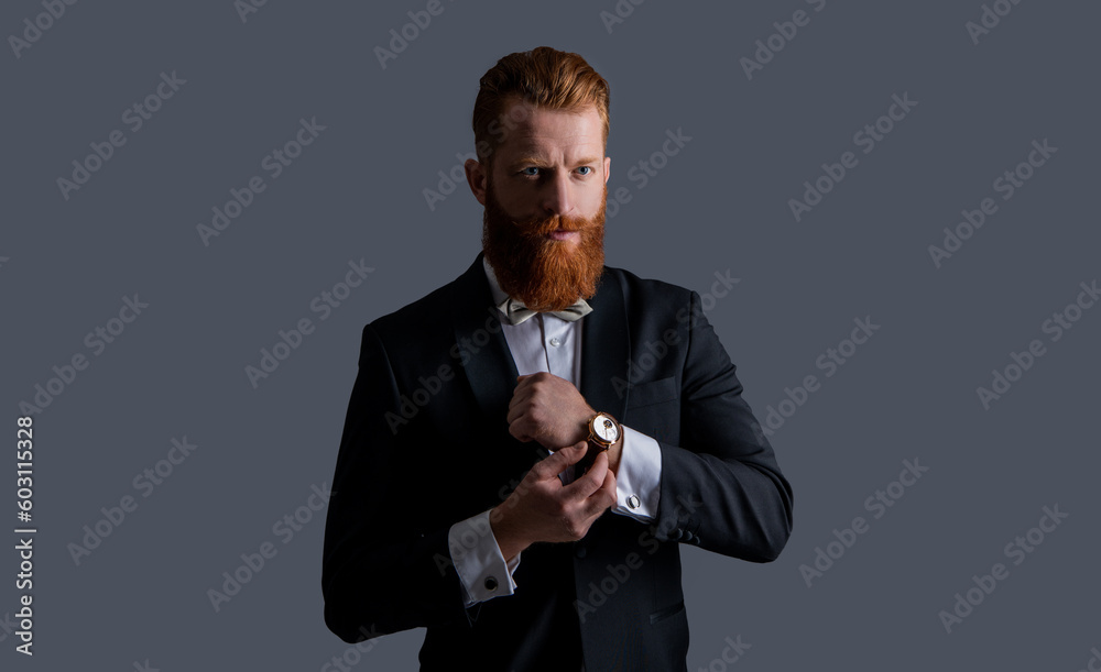 man studio shot in tuxedo and wrist watch. man wearing elegant wrist watch and tuxedo. man studio shot in tuxedo and wrist watch. man wearing elegant wrist watch and tuxedo.