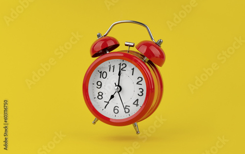 Red alarm clock hangs in the air on yellow background