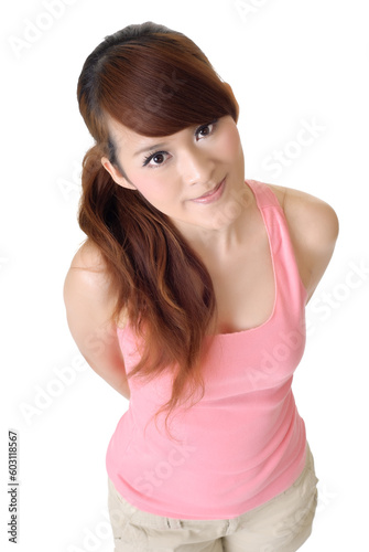 Sweet girl portrait on pink with attractive expression.