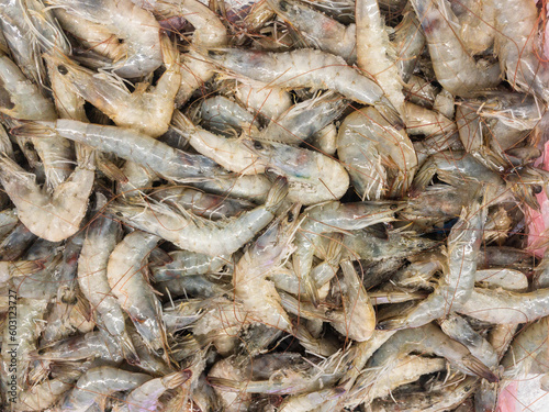 Fresh Shrimps, or prawns, on display in wet market. Seafood abstract background and texture.