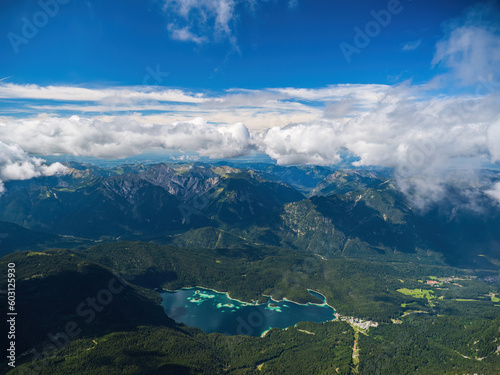 Aerial view of the lake Eibsee and Garmisch-Partenkirchen as seen from the summit of Zugspitze mountain, summer, cloudy sky, sunny weather, Bavaria, Germany, Tirol, Tyrol, Austria
