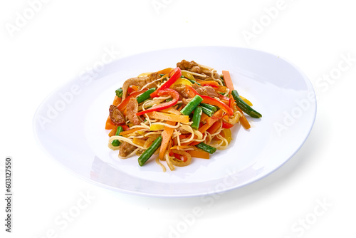 Stir fry egg noodles with chicken, sweet paprika, mushrooms, chives and sesame seeds in bowl. Asian cuisine dish. White table background, top view.