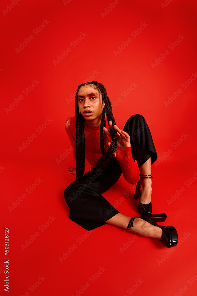 Stylish lady on red backdrop Stylish lady on red backdrop