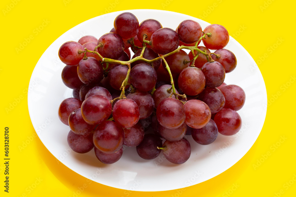 Fresh grape on yellow background. Fresh grape on yellow background.