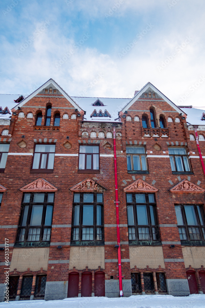 Facade view of red brick Bank of Finland building at Market Square, Vyborg, Russia. High quality photo