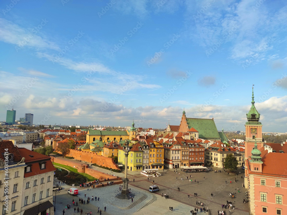 Fototapeta premium WARSAW, POLAND - October 25 2022: Top view of the old town of Warsaw. Royal Castle, ancient townhouses and Sigismund's Column. Warsaw, Poland