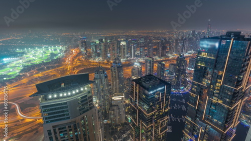 Panorama of Dubai Marina with JLT skyscrapers day to night timelapse, Dubai, United Arab Emirates.