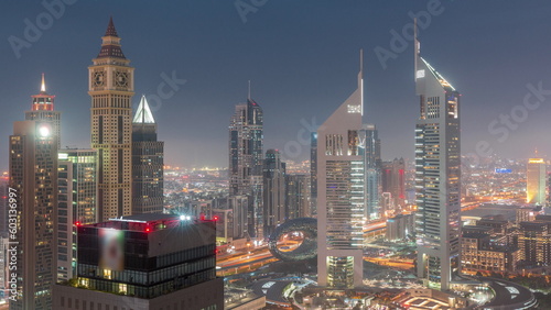 Skyscrapers on Sheikh Zayed Road and DIFC day to night timelapse in Dubai  UAE.
