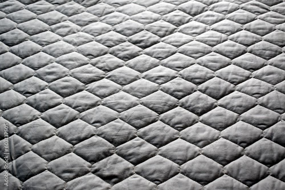 Fototapeta premium Duvet cover texture with matelasse on bed