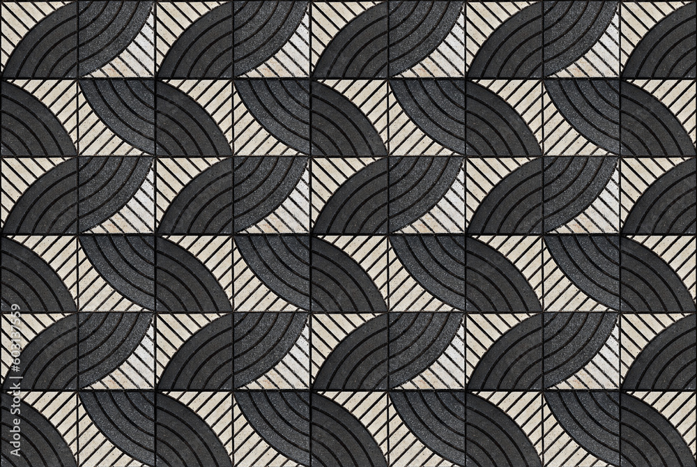 Black and white textured concrete blocks on floor