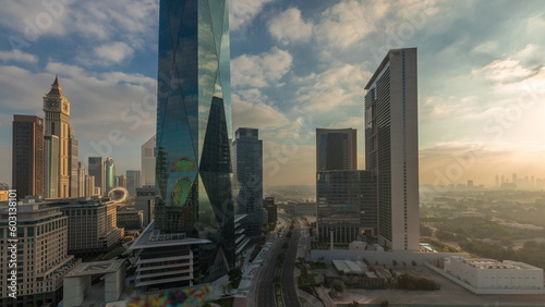 Dubai International Financial district aerial night to day timelapse. Panoramic view of business office towers.