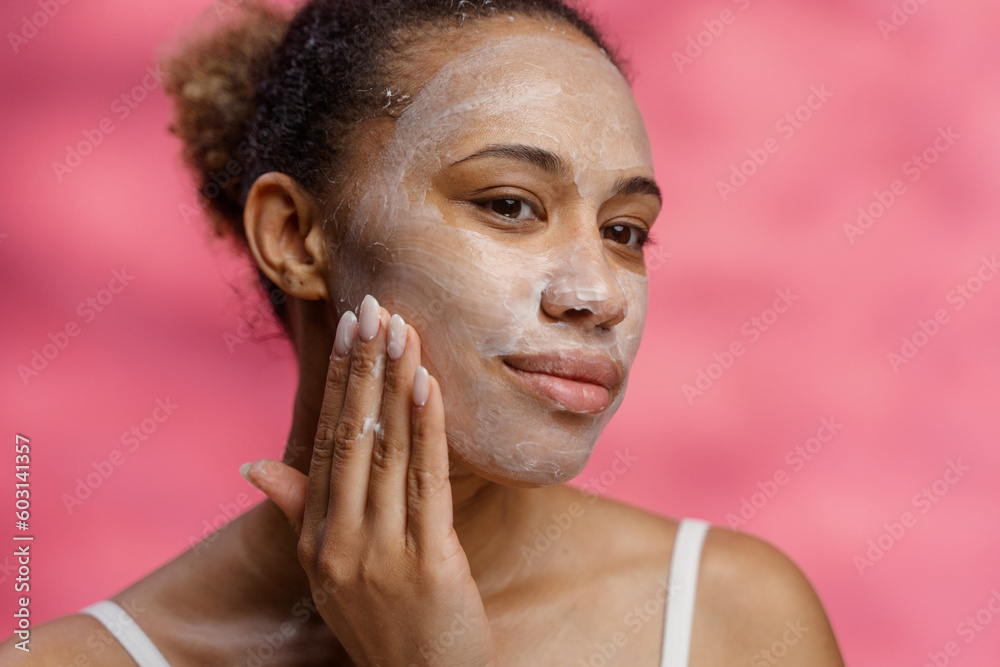 A woman with a cosmetic mask on her face, portrait A woman with a cosmetic mask on her face, portrait