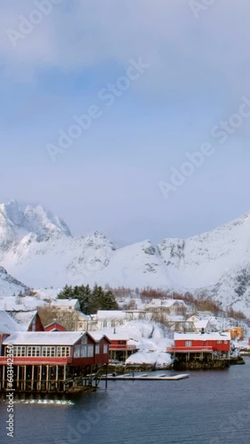 Wallpaper Mural Traditional fishing village A on Lofoten Islands, Norway with red rorbu houses. With snow in winter Torontodigital.ca