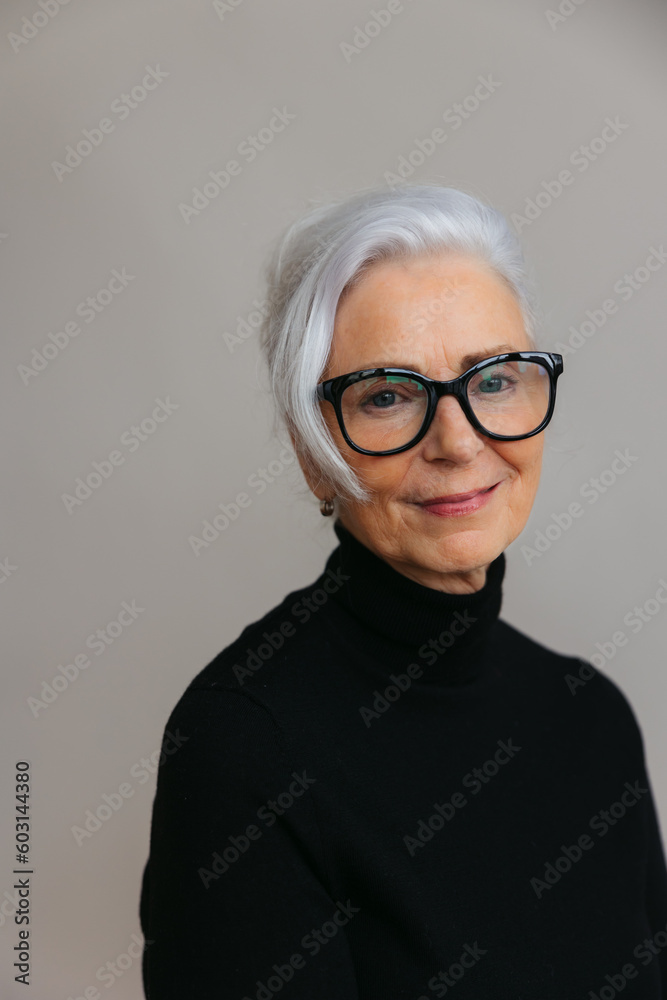 Simple portrait of woman on plain background. Simple portrait of woman on plain background.