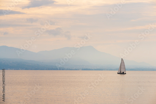 In Lake Geneva, a sailboat photo