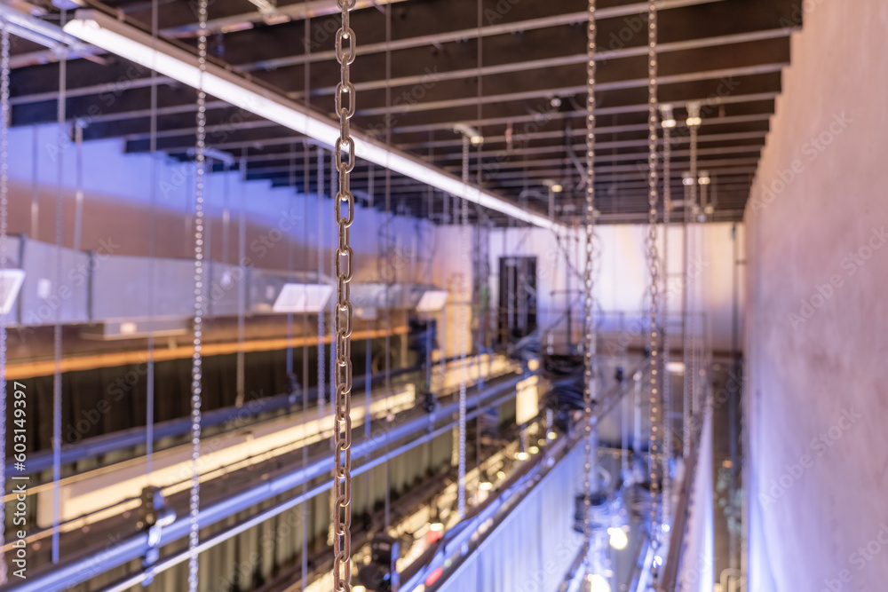 Theater stage rigging with theatrical equipment, lighting, supports
