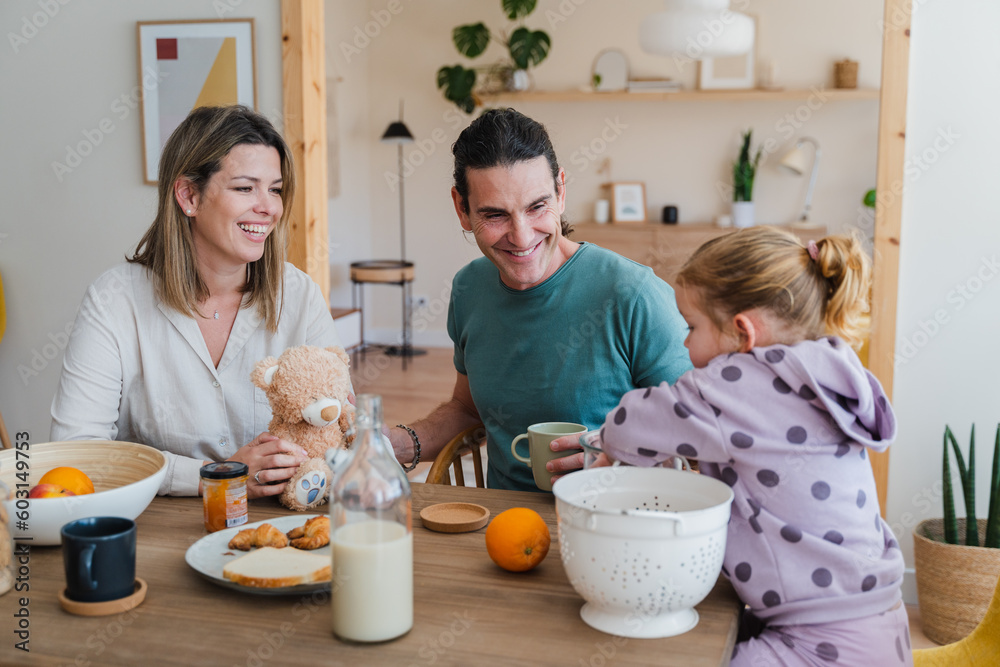 Happy Family Having Breakfast Together At Home Happy Family Having Breakfast Together At Home