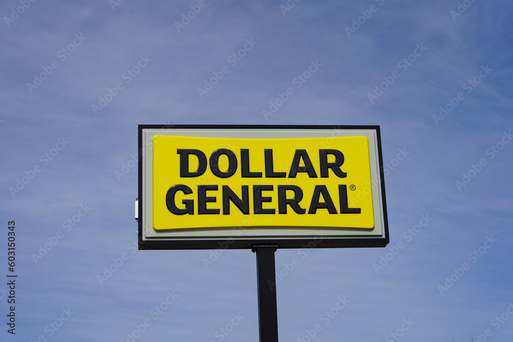 Dollar General signs outside during a sunny day. Dollar General signs outside during a sunny day.