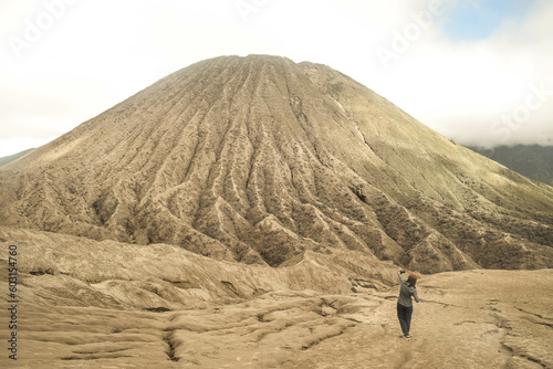 person walking on the dune