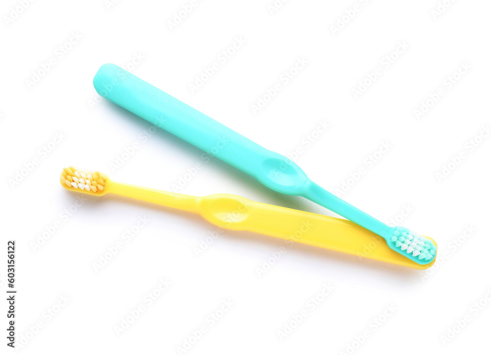 Plastic toothbrushes isolated on white background Plastic toothbrushes isolated on white background