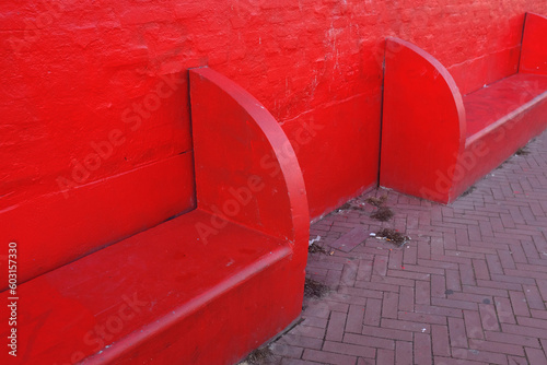 Red benches in Norrebro, Copenhagen, Denmark photo