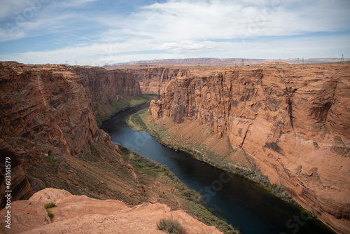 Powell Lake river flowing through a red rocky canyon in Arizona