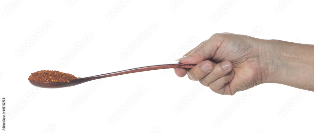 Red Hot Chilli fall, red grain chilli explode abstract cloud fly from wooden spoon. Beautiful complete seed chilly, food object design. Selective focus freeze shot white background isolated Red Hot Chilli fall, red grain chilli explode abstract cloud fly from wooden spoon. Beautiful complete seed chilly, food object design. Selective focus freeze shot white background isolated